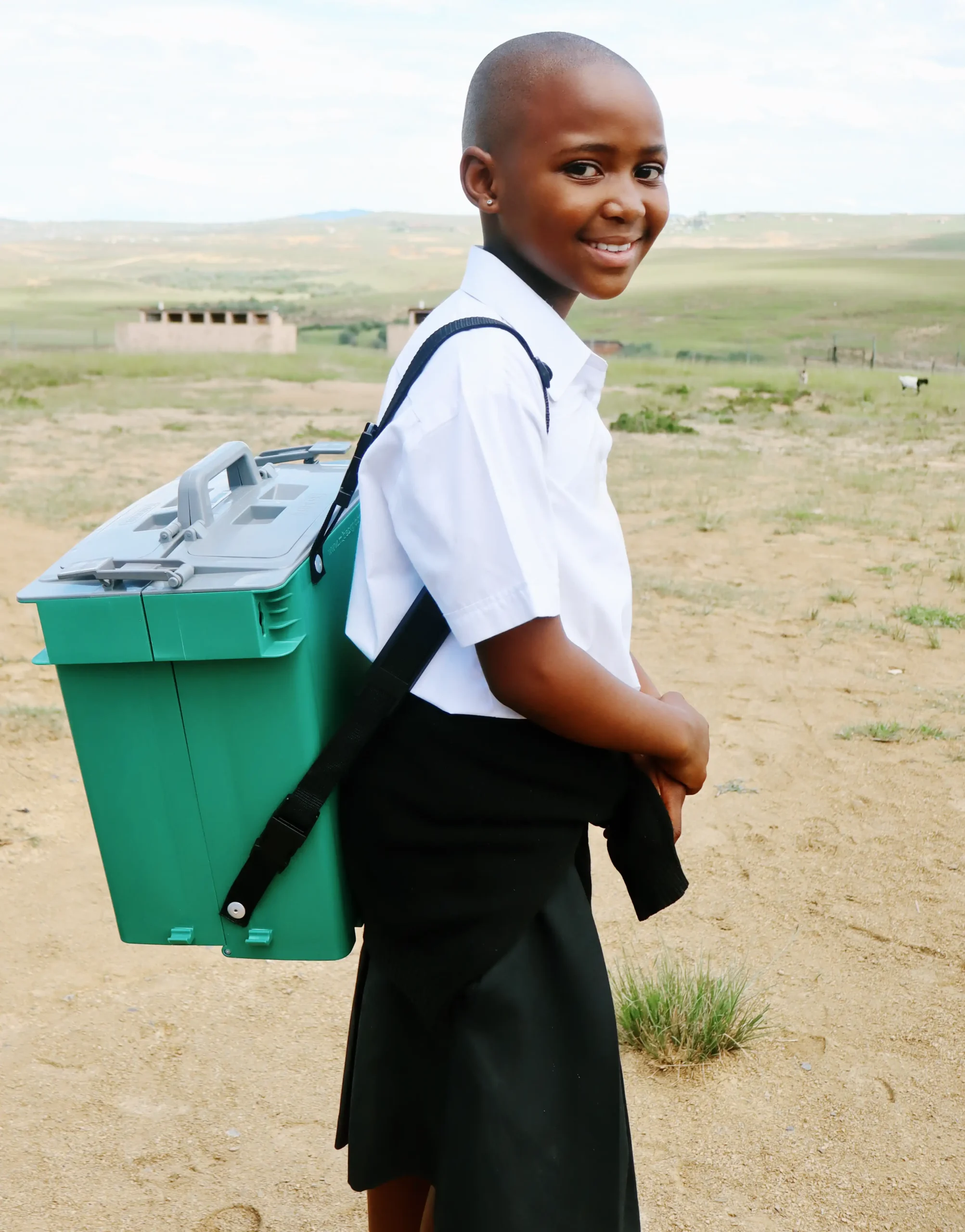 A learner carrying a MiDesk — a rapid-deployment learning solution